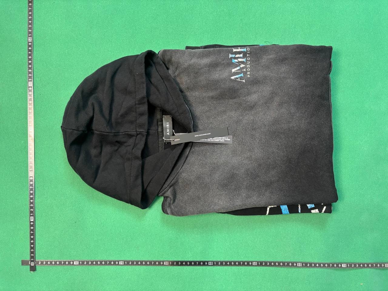 A @ MI rose mask sweater